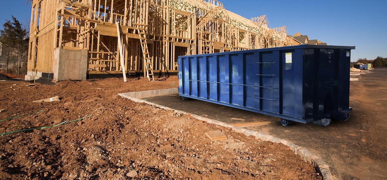 Roll-off dumpster at an American residential construction site